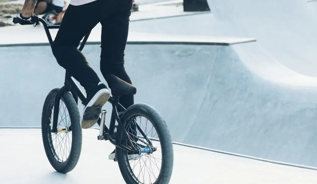 BMX Rider In Skatepark training outdoor
