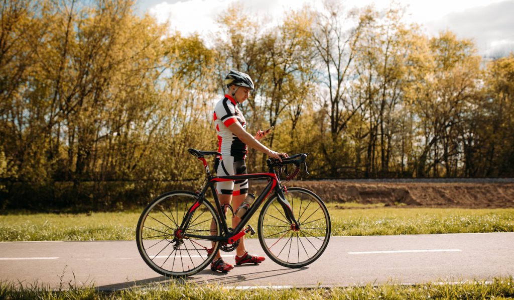 Cyclist, cyclocross training on bike path
