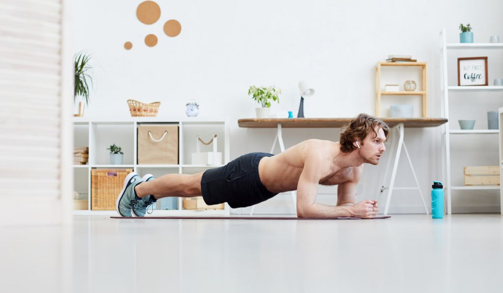 Man doing push-ups at home