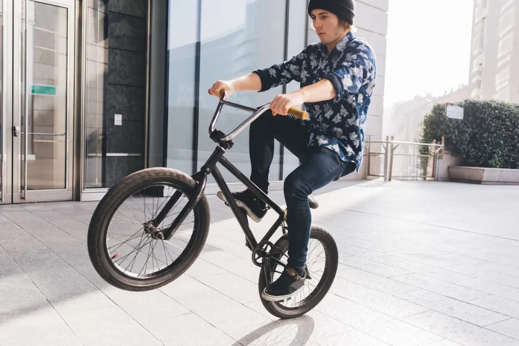 young man using bmx
